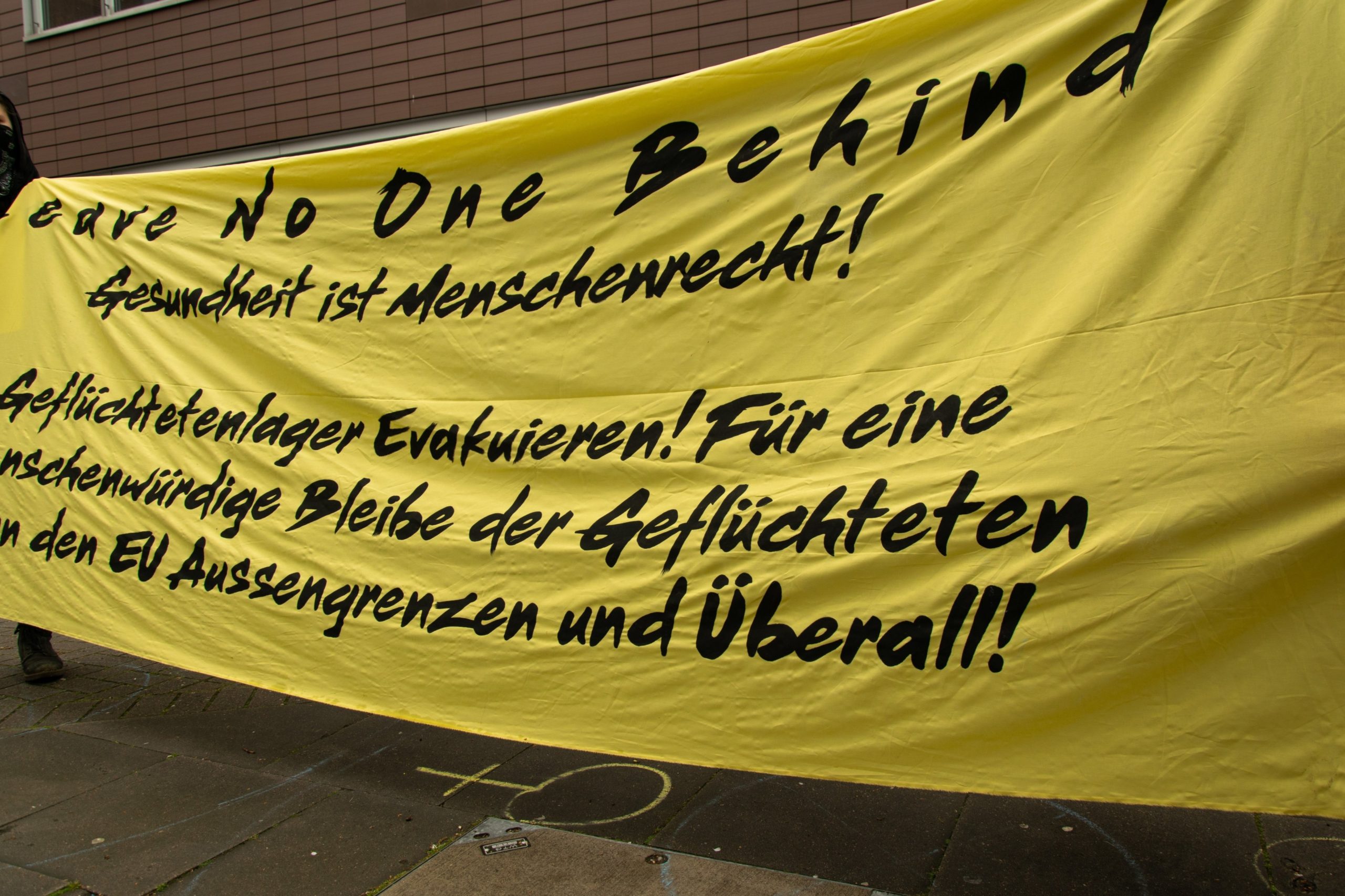„Leave No One Behind“- Kundgebung am 1. Mai vor der SKF